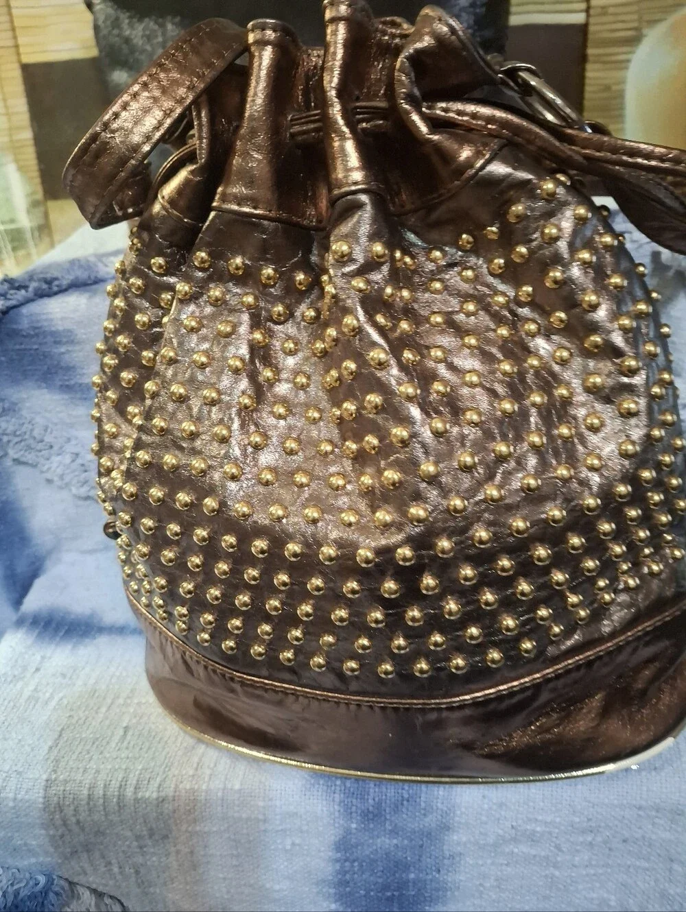 Metallic Brown Studded Drawstring Shoulder Bag